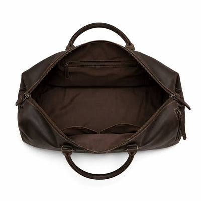 Brown leather duffel bag on a white background