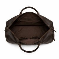 Brown leather duffel bag on a white background