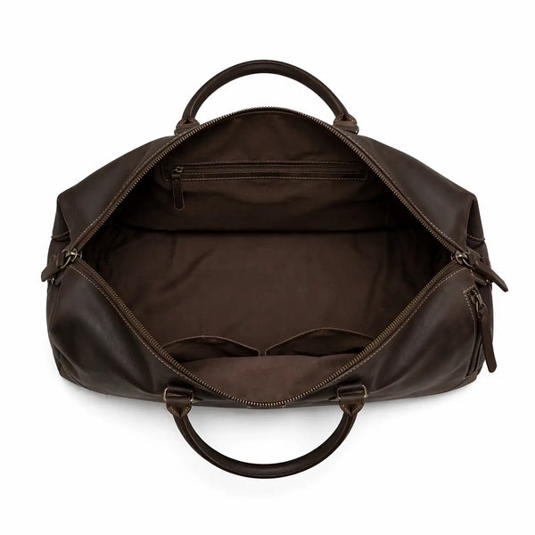 Brown leather duffel bag on a white background
