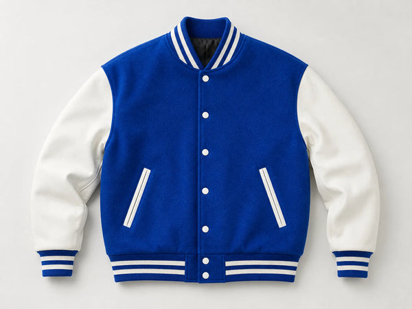 Custom blue and white team varsity jacket, front flat lay