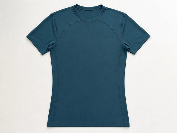Custom compression T-shirt in dark teal stretch jersey, front flat lay