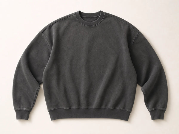 Washed charcoal custom drop-shoulder crewneck sweatshirt laid flat on a light grey background