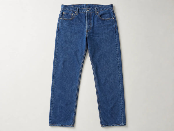 Custom indigo five-pocket jeans, front flat lay