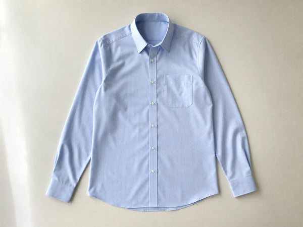Custom light blue office shirt, front flat lay