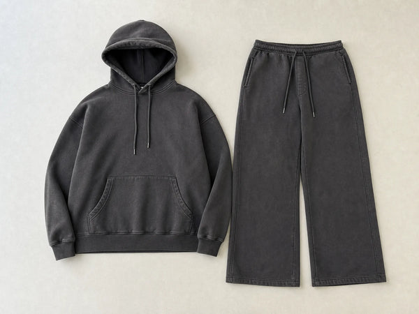 Custom washed charcoal oversized tracksuit with boxy hoodie and wide-leg pants, front flat lay