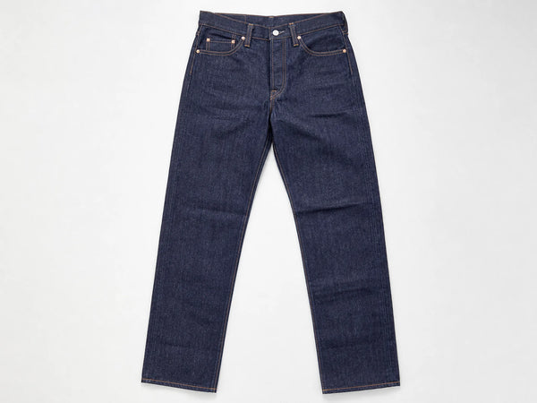 Custom deep indigo raw denim jeans, front flat lay