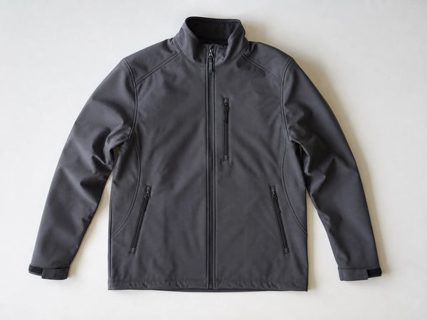Custom graphite softshell work jacket, front flat lay