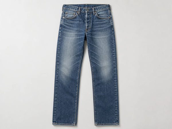 Custom faded indigo vintage-wash jeans, front flat lay