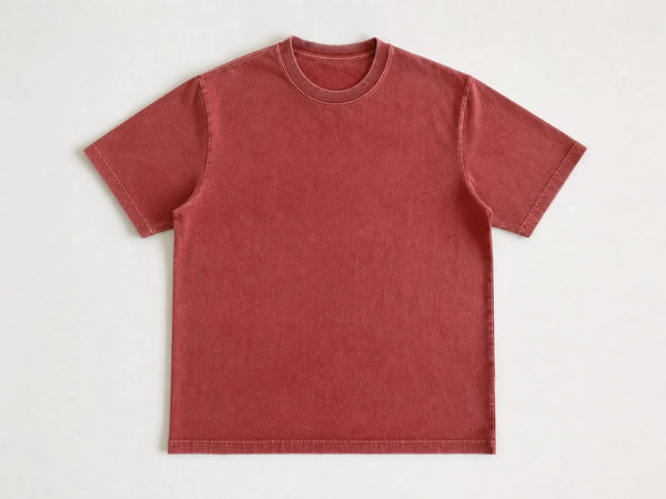 Custom vintage-wash T-shirt in muted brick red cotton, front flat lay