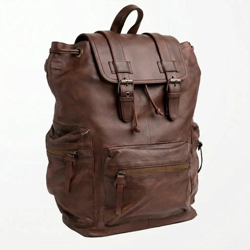 Brown leather backpack on a white background