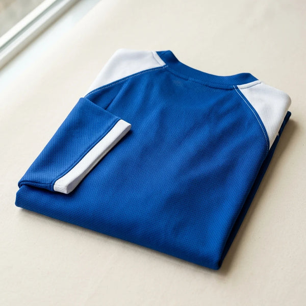Folded royal blue performance mesh custom team jersey sample — sportswear sampling by DenimByte