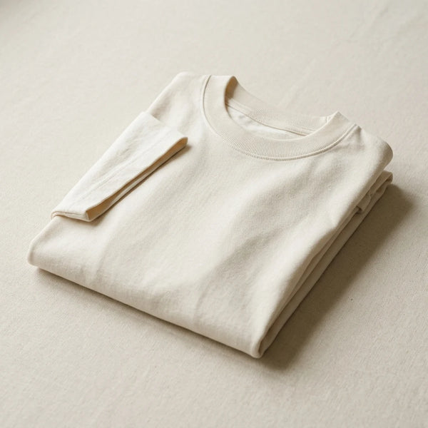 Folded off-white heavyweight custom t-shirt sample — T-shirt sampling by DenimByte